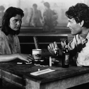 DOWN TWISTED, from left, Carey Lowell, Charles Rocket, 1987, ©The Cannon Group