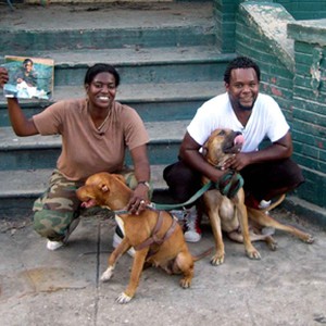 Kim Rivers Roberts and Scott Roberts outside their flood-damaged home in New Orleans in TROUBLE THE WATER, a film by Tia Lessin and Carl Deal. photo 13