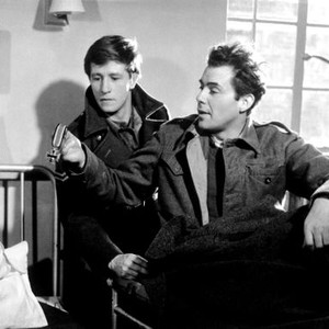 THE PASSWORD IS COURAGE, from left: Alfred Lynch, Dirk Bogarde, 1962