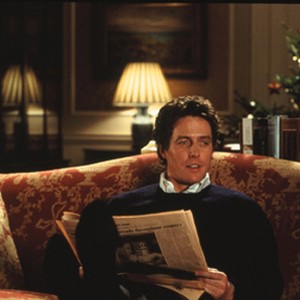 The Prime Minister (HUGH GRANT) awaits Christmas Eve-alone-in Richard Curtis' romantic comedy Love Actually. photo 6