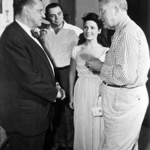 JUBAL, novelist Paul I Wellman, Ernest Borgnine, Valerie French, director Delmer Daves, on set 1956.