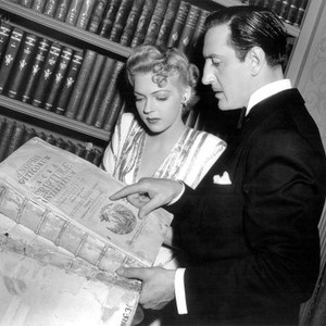 THE BLACK CAT, Anne Gwynne, Basil Rathbone examining a book on set, 1941