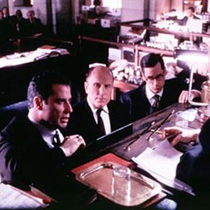 Judge Skinner (John Lithgow, right), Jan Schlichtmann (John Travolta) and his partner Bill Crowley (Zeljko Ivanek, second from right) face litigator Jerome Facher (Robert Duvall, second from left). photo 9