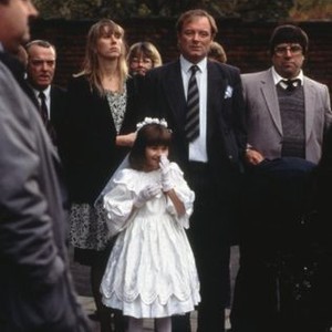 RAINING STONES, center to right: Julie Browm (jacket over dress), Gemma Phoenix (white dress), Bruce Jones (necktie), Ricky Tomlinson (jacket over sweater), 1993, (c) Northern Arts Entertainment