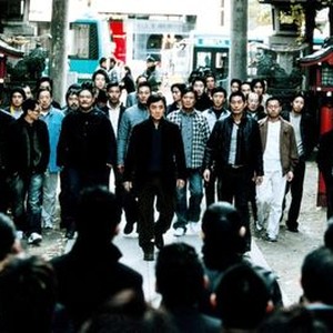 SHINJUKU INCIDENT, (aka SAN SUK SI GIN), LAM Suet (foreground, left of center, moustache, black clothing), Jackie CHAN (foreground center), 2009. ©Lark Films