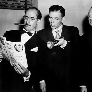 DOUBLE DYNAMITE, from left, Groucho Marx, Frank Sinatra, Howard Freeman, 1951