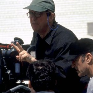 PUSHING TIN, director Mike Newell (center), on set, 1999. TM and Copyright ©20th Century Fox Film Corp. All rights reserved..