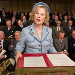 THE IRON LADY, foreground: Meryl Streep as Margaret Thatcher, 1st row from left: Nick Dunning (striped tie), John Sessions, Stephen Boxer, Peter Pacey, Julian Wadham, 2nd row, to the right of Streep: Angus Wright (glasses), Richard E. Grant (high forehead)