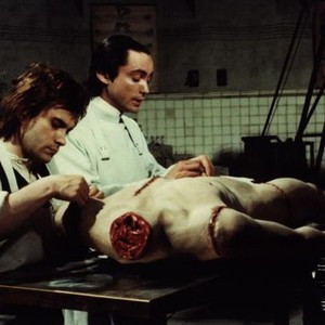 ANDY WARHOL'S FRANKENSTEIN, Arno Juerging, Udo Kier, 1974, working on headless corpse