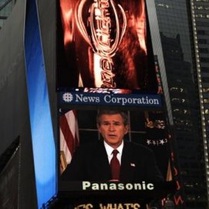 SHADOWS OF LIBERTY, during his national address, President Bush launches the Iraq War, broadcast in New York City's famous Times Square and throughout the world, on March 19, 2003, 2012. © Syndicado