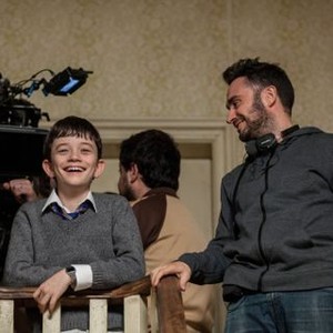 A MONSTER CALLS, from left: Lewis MacDougall, director J.A. Bayona, on set, 2016, ph: Quim Vives/© Focus Features
