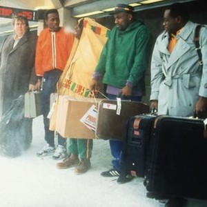 COOL RUNNINGS, John Candy, Leon, Doug E. Doug, Malik Yoba, Rawle D. Lewis, 1993, luggage