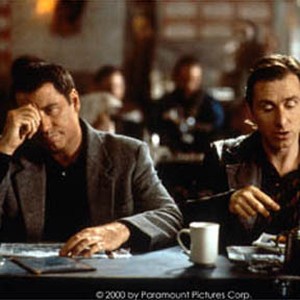 (Left to right) John Travolta as Russ Richards and Tim Roth as Gig Latroy.