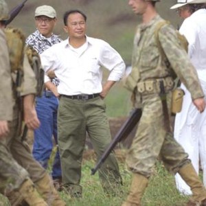 WINDTALKERS, Producer Terrence Chang, director John Woo on the set, 2002 (c) MGM.