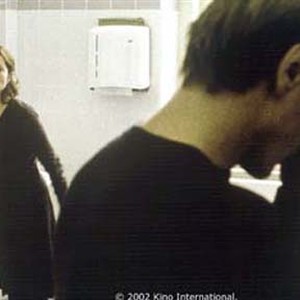 Isabelle Huppert as Erika, Benoît Magimel as Walter.