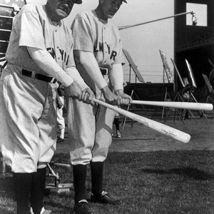 Babe Ruth as a Boston Brave poses with Red Sox players