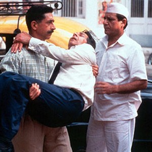 Roshan Seth is carried to Om Puri in Shooting Gallery's Such A Long Journey photo 11