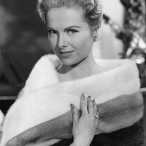 PARIS HOLIDAY, Martha Hyer, in a tricolor mink stole by Pierre Balmain, 1958