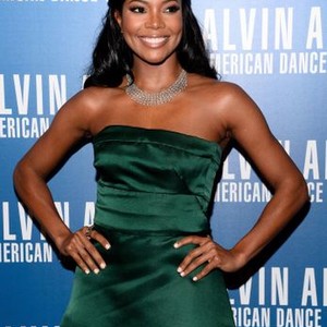 Gabrielle Union (wearing a Prada gown) at arrivals for Alvin Ailey American Dance Theater's Opening Night Benefit Gala, New York City Center, New York, NY December 4, 2013. Photo By: Eli Winston/Everett Collection