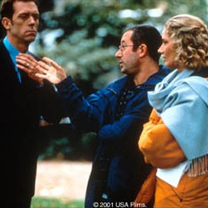 (Left to right) Hugh Laurie, Director Ben Elton and Joely Richardson discuss a scene on the set of Elton's romantic comedy MAYBE BABY, a USA FILMS release. photo 4
