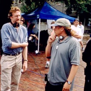 MUPPETS FROM SPACE, producer Brian Henson (left), director Tim Hill (right of center), on set, 1999. ©Columbia Pictures
