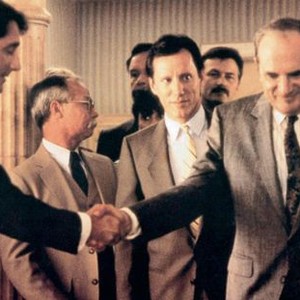THE BOOST, James Woods (yellow tie), Steven Hill (head down), 1988, © MGM