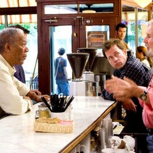 FEAST OF LOVE, foreground: Morgan Freeman, Greg Kinnear, director Robert Benton, on set, 2007. ©MGM