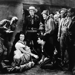 IN OLD CALIENTE, first, third, fourth, fifth, sixth and seventh from left: Jack La Rue, Katherine DeMille, Roy Rogers, Paul Marion, Gabby Hayes, 1939