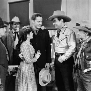 THE STRANGER FROM PECOS, from left: Steve Clark, Edmund Cobb, Christine McIntyre, Kirby Grant, Johnny Mack Brown, Raymond Hatton, 1943