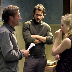 Director ANDREW DOUGLAS discusses a scene with RYAN REYNOLDS and MELISSA GEORGE on the set of THE AMITYVILLE HORROR. photo 7