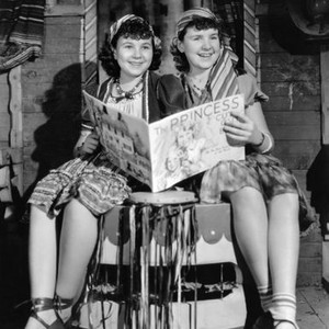 RASCALS, Jane Withers, left, and her stand-in, Kay Connor, rad about Princesses Elizabeth and Margaret between takes, 1938, ©20th Century-Fox Film Corporation, TM & Copyright