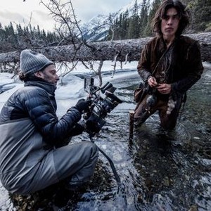 THE REVENANT, from left: cinematographer Emmanuel Lubezki, Forrest Goodluck, on set, 2015. ph: Kimberley French/TM and Copyright © 20th Century Fox Film Corp. All rights reserved.