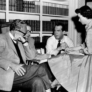 THERE'S ALWAYS TOMORROW, from left: director Douglas Sirk, dialogue coach Jack Daniels, Fred MacMurray, Joan Bennett on set, 1956