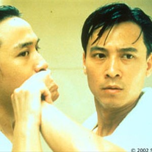(l-r) Shao-dung (Lei Huang), a young cellist, is drawn to the worldly opera singer Lin Chung (Chao-te Yin) in FLEEING BY NIGHT.
