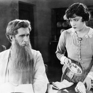 UNDER THE LASH, from left: Russell Simpson, Gloria Swanson,  1921