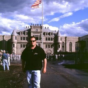 LAST CASTLE, Director Rod Lurie standing in front of the Tennessee State Prison on location, 2001