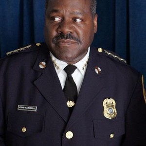 Frankie R. Faison as Comm. Ervin H. Burrell
