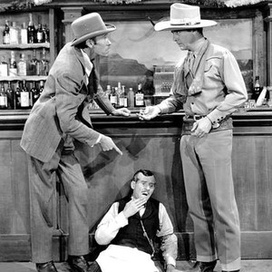 OUTLAW ROUNDUP, from left: Guy Wilkerson, Dan White, James Newill, 1944