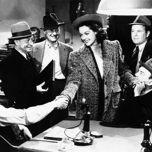 HIS GIRL FRIDAY, from left: Porter Hall, Ernest Truex, Roscoe Karns (rear), Rosalind Russell, Regis Toomey (rear), Cliff Edwards, 1940