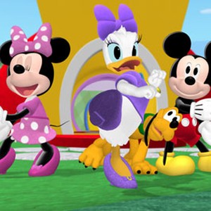 Minnie Mouse, Daisy Duck, Pluto and Mickey Mouse (from left)