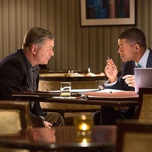 (L-R) Alec Baldwin as Dr. Julian Bailes and Will Smith as Dr. Bennet Omalu in "Concussion." photo 19