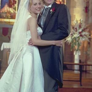 Sarah (Brittany Murphy) and Tom (Ashton Kutcher) in JUST MARRIED. photo 16