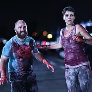 Nicolás Martinez as Pollo and Andrea Osvart as Monica in "Aftershock."