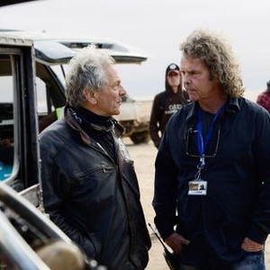 MAD MAX: FURY ROAD, from left: director George Miller, producer Doug Mitchell, on set, 2015. ph: Jasin Boland/©Warner Bros.