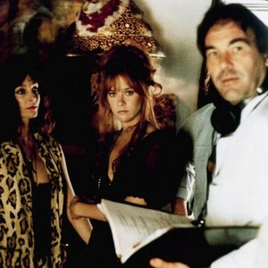 THE DOORS, from left, Kathleen Quinlan, Meg Ryan, director Oliver Stone, 1991, ©TriStar Pictures