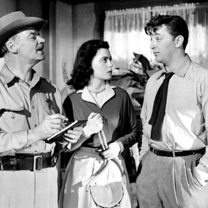 WHERE DANGER LIVES, from left: Ray Teal, Faith Domerge, Robert Mitchum, 1950