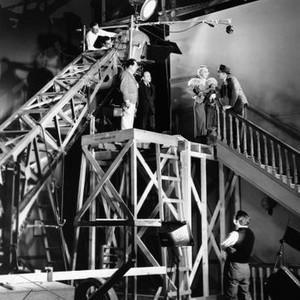 STRAIGHT IS THE WAY, on platform from left; cinematographer Lucien Andriot, director Paul Sloane watch Gladys George, Franchot Tone performing a scene on set, 1934