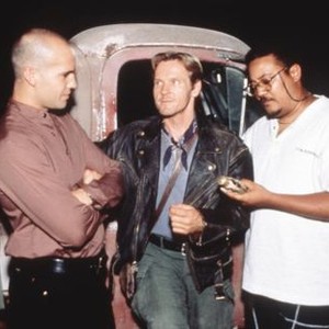 TALES FROM THE CRYPT PRESENTS: DEMON KNIGHT, from left: Billy Zane, William Sadler, director Ernest R. Dickerson on set, 1995, © Universal