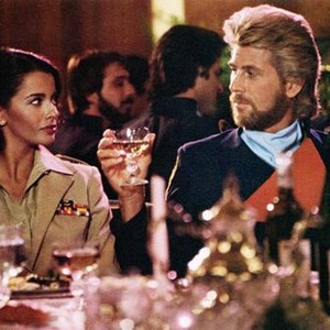 MEGAFORCE, from left: Persis Khambatta, Barry Bostwick, 1982, TM and Copyright ©20th Century Fox Film Corp. All rights reserved.