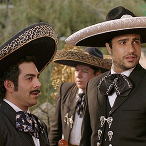 (L-R) Omar Chaparro as Canicas and Jaime Camil as Alejandro in "Pulling Strings." photo 18